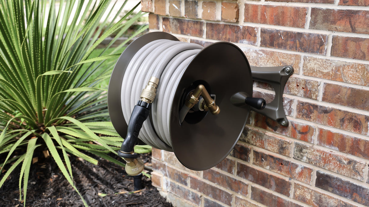 How to Mount a Garden Hose Reel to Your House