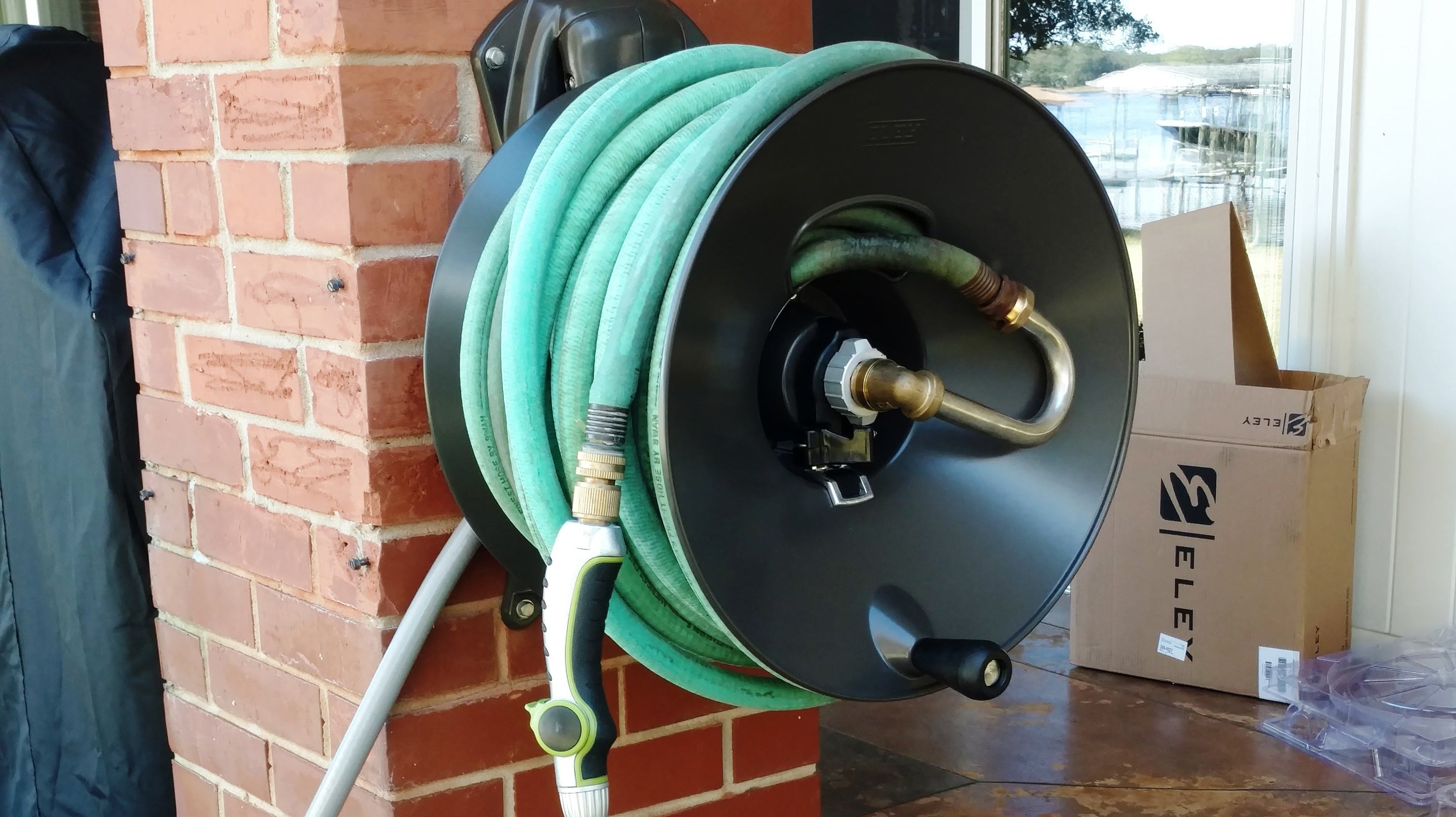 How to Mount a Hose Reel on a Narrow Brick Column