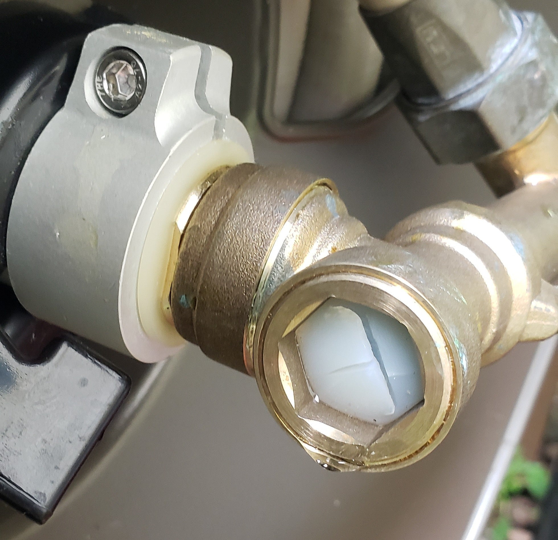 Close-up of 4291 brass swivel plumbing frost gasket with visible crack and wear
